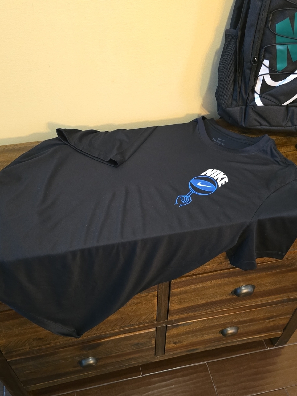Men's Nike Black Short-Sleeve Tee with Blue Logo Graphic